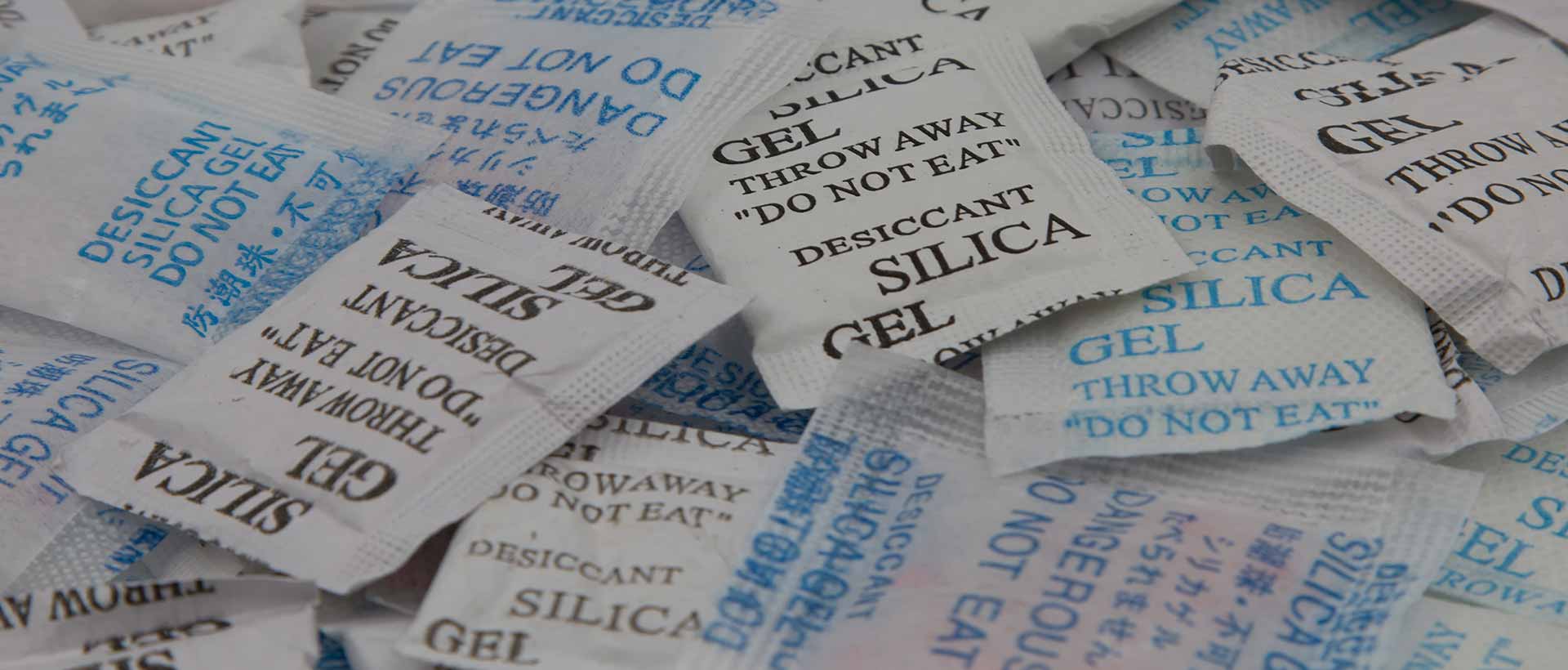 Many silica gel packets in one pile