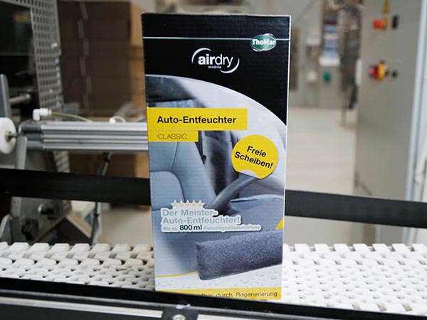 Packaging of an airdry Auto dehumidifier from ThoMar on a conveyor belt in production