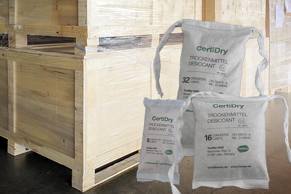 CertiDry desiccant bags according to DIN 55473 in front of export boxes